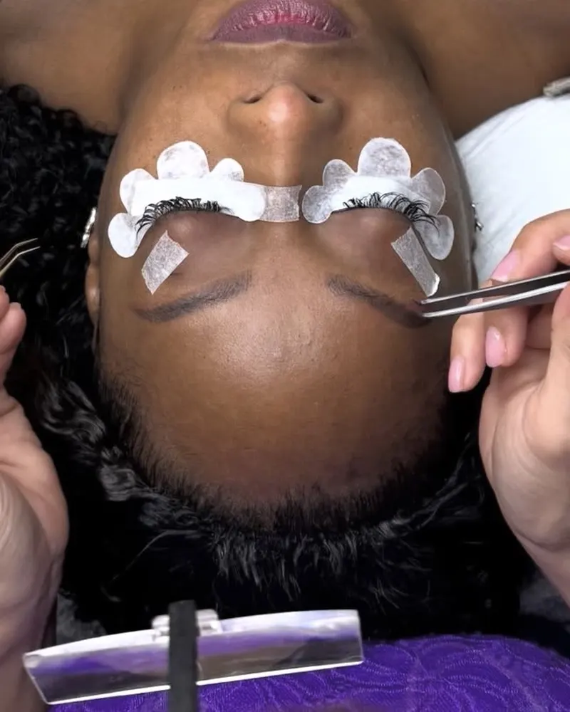 Lash extensions being applied in the salon
