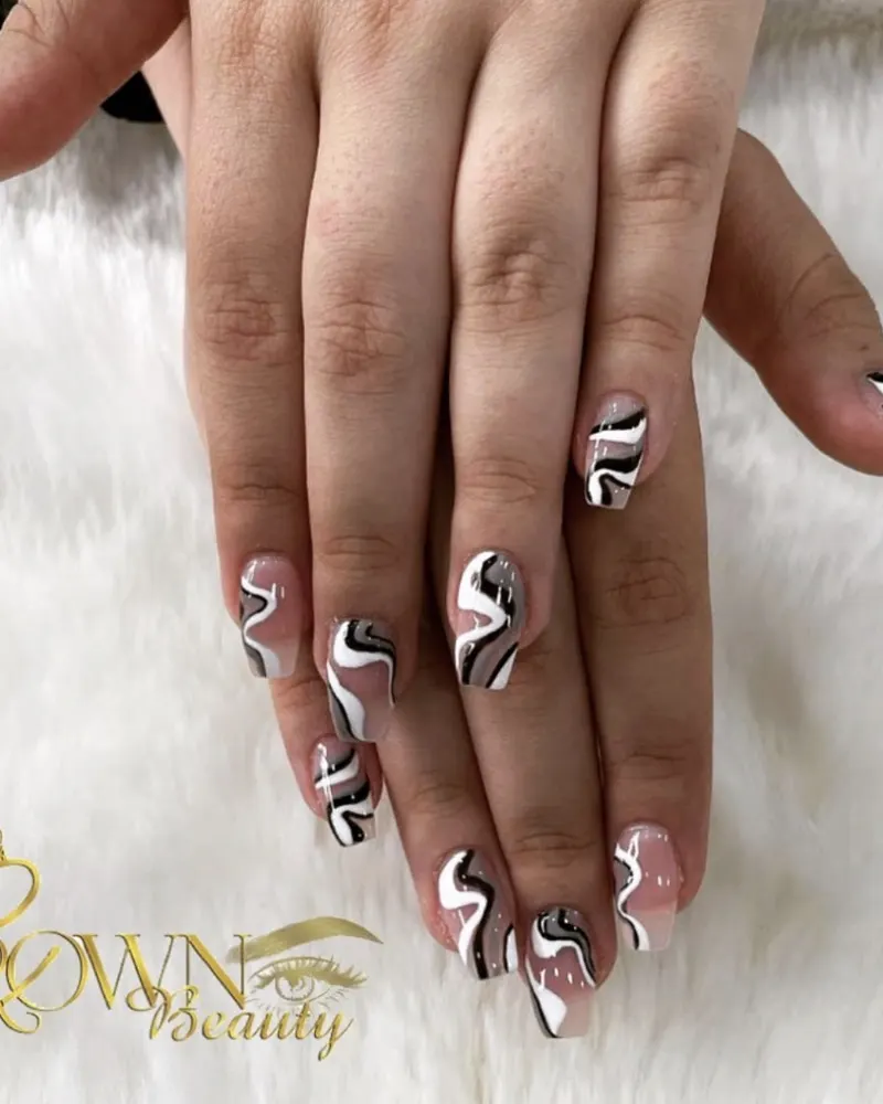 Black and white swirl nail art
