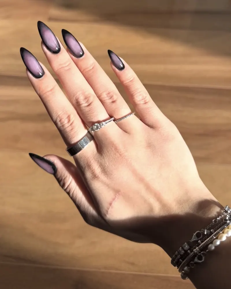 Black aura almond nails